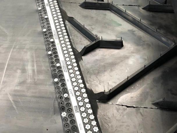 Chevron belt repaired with MLT Super Screw